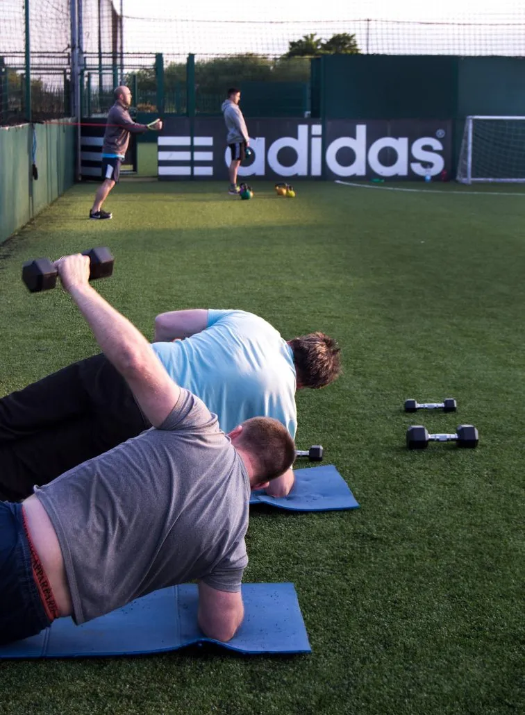 Clients perfecting their fitness techniques and weightloss during the Bootcamp class with TPTS Fitness Club