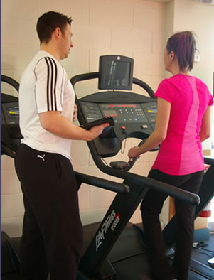 Personal Trainer Darren Wilce with a client at TPTS fitness gym